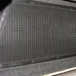 Cargo net from Canyon State for securing items in the truck bed, mounted in a truck cap.